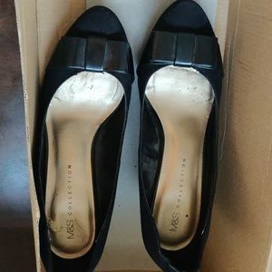 Black Mark and Spencer bow wedge pumps